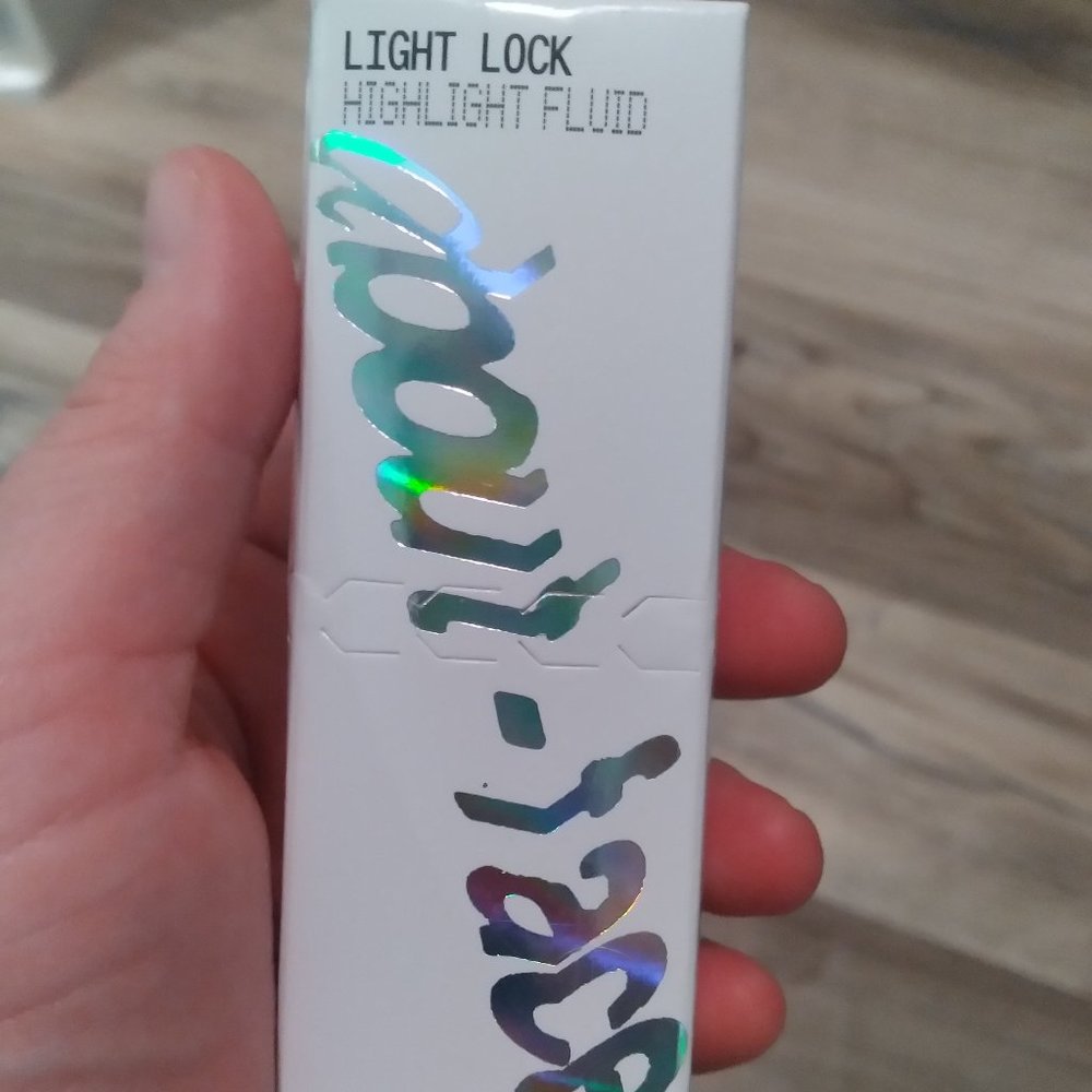 ABOUT FACE LIGHT LOCK HIGHLIGHTER FLUID